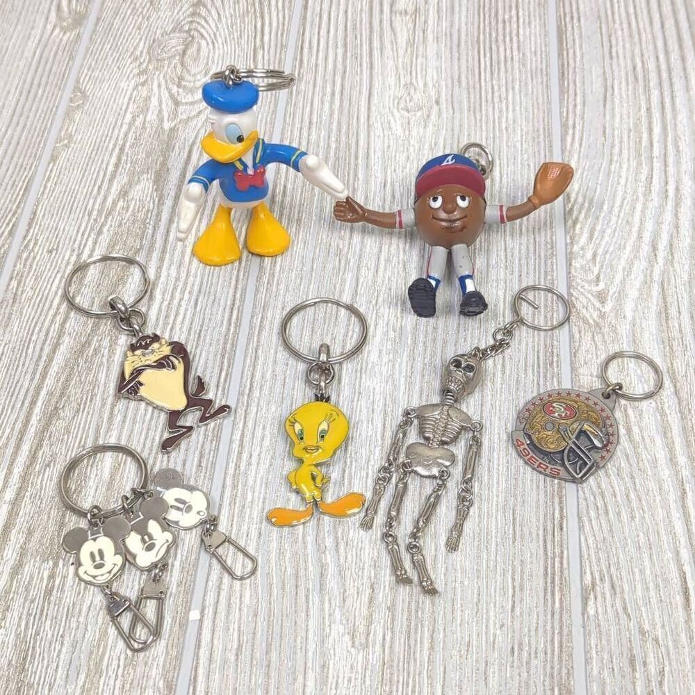 Vintage Lot of 7 Assorted Keychain Figures Disney Looney Tunes NFL Mickey Mouse